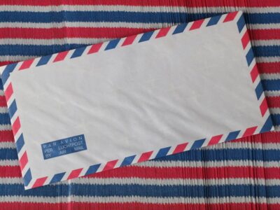 Street Mailbox Full of Bulk‑Stamped Letters