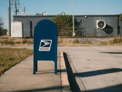 Public Mailbox Loaded with Cheap Flag Stamped Mail